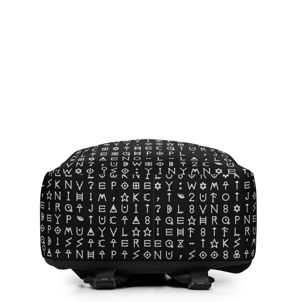 Underside of the black backpack, white glyph rows continuing across the base panel