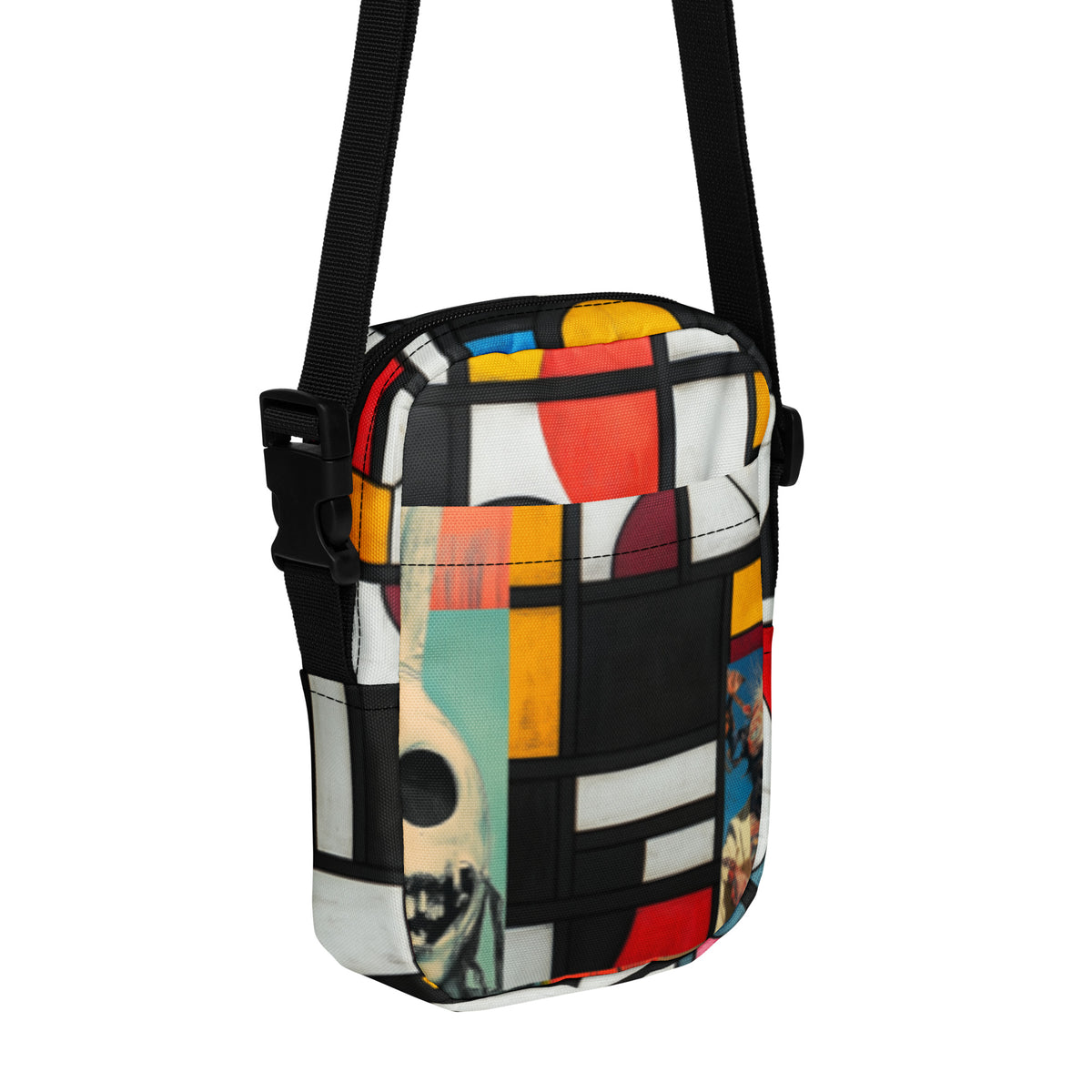 Crossbody bag in a black Mondrian grid of red, yellow and blue, with a pale animal skull on mint